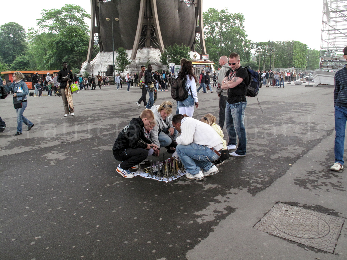 buying eiffel toweres beneath the eiffel tower